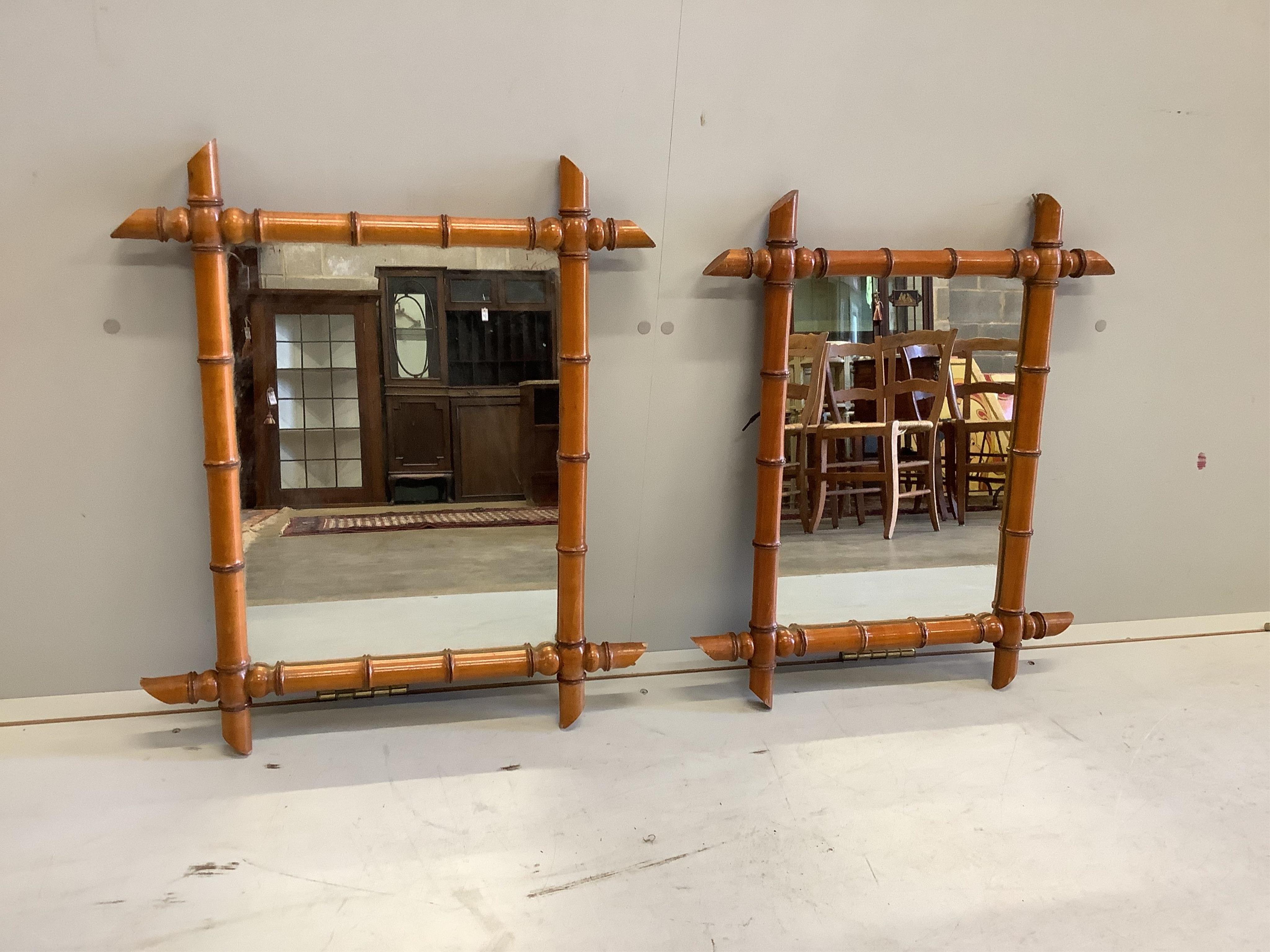 A near pair of simulated bamboo wall mirrors and a similar wall hanging coat rack, mirrors 63 x 52cm. Condition - fair to good